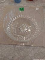 Top view of clear glass bowl showing starburst and diamond pattern