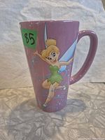 Front view showing Tinker Bell graphic on pink mug