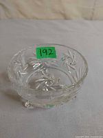 Oblique view showing bowl, pinwheel pattern and three feet