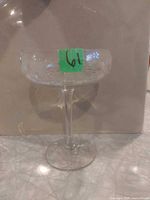 Side view of clear etched coupe-style fruit glass