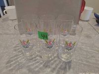 Six Schwabenbräu beer glasses front view showing logos