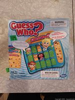Front of Guess Who? box showing branding and age rating