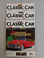 Front covers of all three Hemmings Classic Car magazines stacked