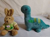 Front view of both plush toys