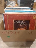 Box of vinyl LPs with With Love, Bobby visible