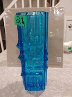 Full view of blue square glass vase