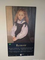 Full view of mounted Renoir exhibit poster