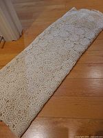 Tablecloth folded showing crochet motif detail
