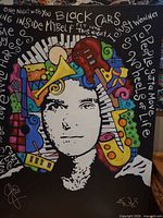 Full view of painting showing abstract portrait with instruments and signatures