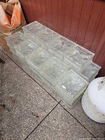 Stack of glass blocks against siding