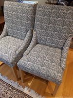 Front view of both upholstered accent chairs