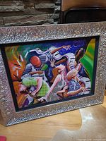 Front view of framed Marcus Glenn giclée showing artwork and hammered silver frame