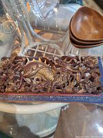 rectangular carved wood panel, dragon and floral design