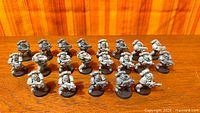 Full lot of assembled Space Marine miniatures in four rows