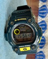 Front view of Casio G-Shock digital watch showing display and buttons