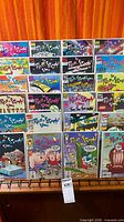 Front view of 20 Ren & Stimpy Show comic books, bagged and boarded, displayed in 4×5 grid
