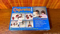 Front of Capsela 200 box showing branding and model information