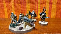 Overall view of heavy weapon base and two individual infantry figures