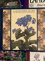 Front cover of Gardener’s Diary with other book covers partially visible
