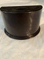 Front view showing half-moon shape and smooth finish