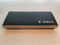 Closed black Parker presentation box