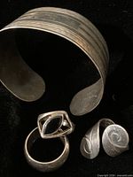 All four sterling pieces grouped