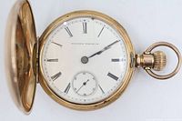 Dial view showing brand, Roman numerals, sub-seconds