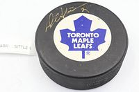 Top view showing Maple Leafs logo and Darryl Sittler autograph