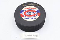Signed Montreal Canadiens puck with Gump Worsley name card