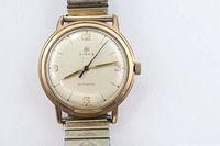 Front view of Birks gold-plated watch showing dial, case and bracelet