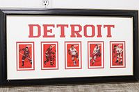 Full view of framed Detroit Red Wings autograph card display