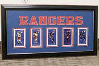 Full view of framed Rangers display with five signed cards