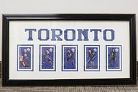 Full view of framed display showing all five autographed cards and TORONTO header