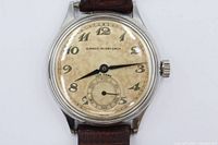 Front view of watch showing dial, case and strap ends