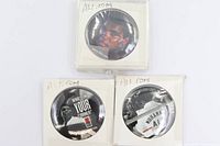 All three Muhammad Ali promotional pinback buttons in sleeves