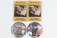 Front view showing four Muhammad Ali themed pins – two rectangular Clinton handshake, two round Ali-Frazier fight scenes