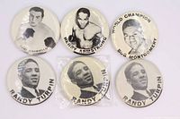 All six vintage boxing pinback buttons laid out, three Randy Turpin (one sealed), plus Tami Mauriello, Henry Armstrong, and Bob Montgomery