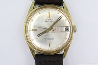 Front view of Gruen Precision watch showing dial, case and strap