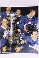 Signed 10x8 Toronto Maple Leafs Stanley Cup photo showing three autographs