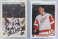 Front view of both autographed hockey cards in protective sleeves