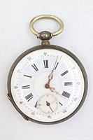 Front view of antique mechanical key-wind pocket watch showing white enamel dial with Roman numerals and sub-seconds dial