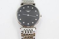 Front view of Longines watch showing dial, diamond markers and bracelet