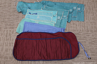 All ten cloth pouches laid out showing colors, stitching and Birks logos