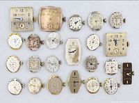 All 23 Bulova and Lady Elgin watch movements laid out