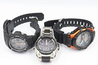 Front view of three watches showing cases, dials, bands and overall design