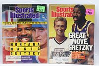 Front covers of both Sports Illustrated magazines in sleeves