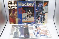 Front covers of all magazines and card pages visible