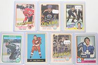 Fronts of all seven rookie hockey cards in holders