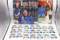 Front view of three Gretzky calendars and two Oilers uncut card sheets