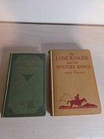 Front covers of both hardcover books